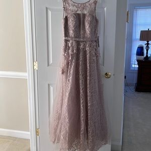 Brand new never wear it . In light blush color